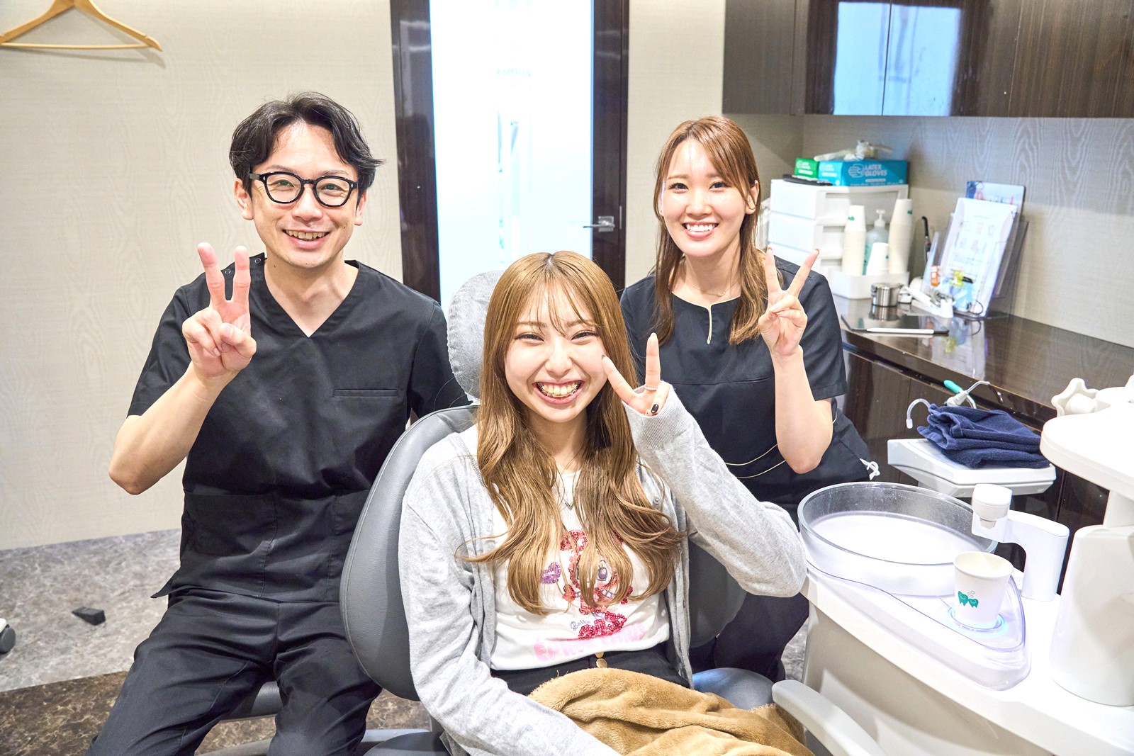 粟田先生と患者さんの画像